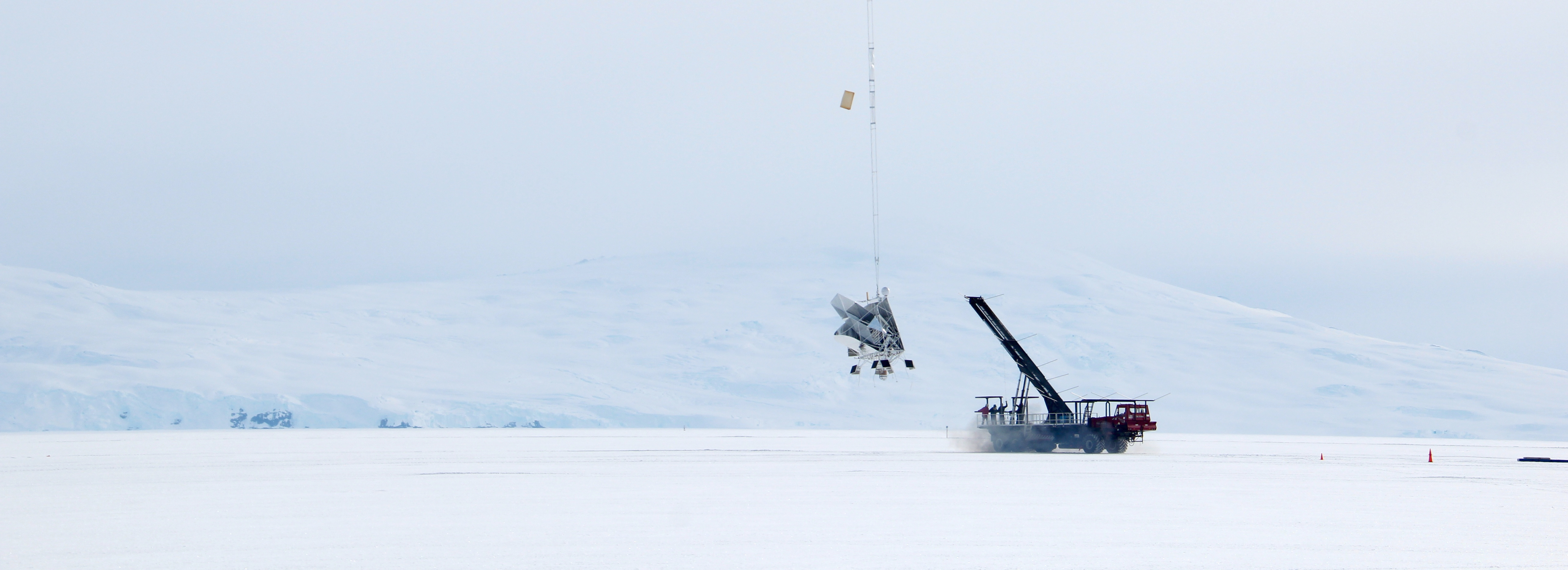 The BLASTpol telescope leaves the launch vehicle. [Tristan Matthews, December 2012]